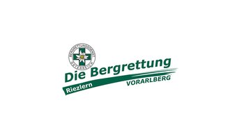 Das Bild zeigt das Logo des Bergrettungsdienstes Österreich. Es ist mit den Worten "Die Bergrettung Riezlern Vorarlberg" sowie einem Emblem mit einer Blume gestaltet. | © Bergrettung Vorarlberg