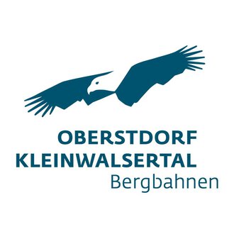 A logo with a stylized eagle in flight. Below, the text "Oberstdorf Kleinwalsertal Bergbahnen" is displayed. | © OBERSTDORF · KLEINWALSERTAL BERGBAHNEN