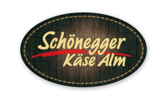 © Schönegger Käse Alm Logo Ein Logo der Schönegger Käse Alm. Es zeigt eine nostalgische Schrift auf einem strukturierten Hintergrund. | © Schönegger Käse Alm Logo