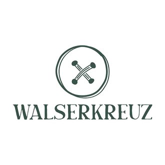 © Walserkreuz_logo A simple logo with the inscription "WALSERKREUZ". Above it is a circular symbol with crossed elements. | © Walserkreuz_logo
